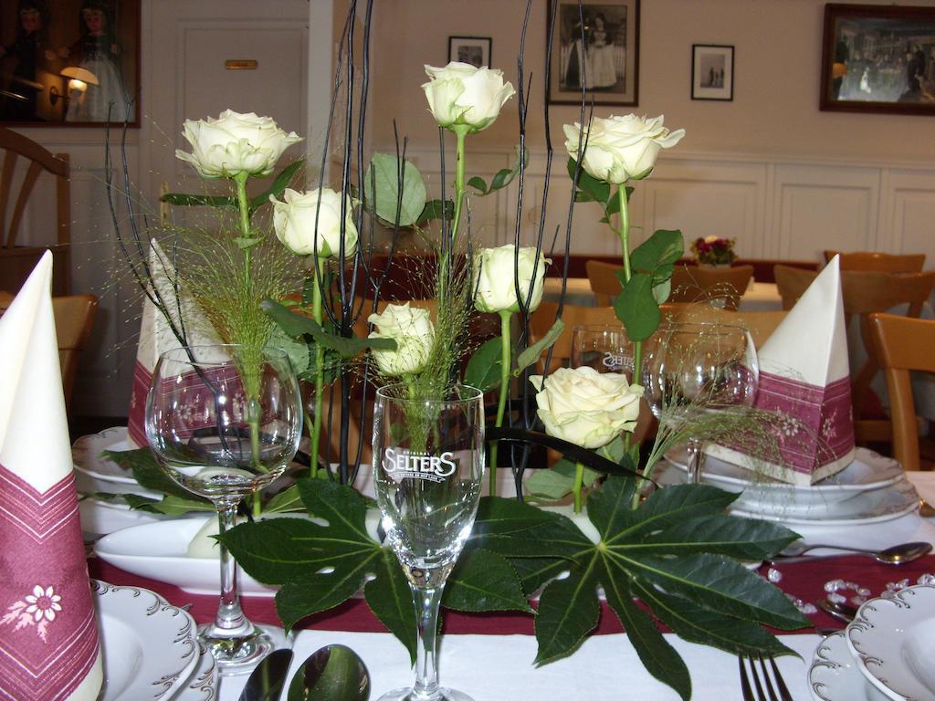 Ferienwohnungen Im Hotel Garni Zur Post Utersum Extérieur photo