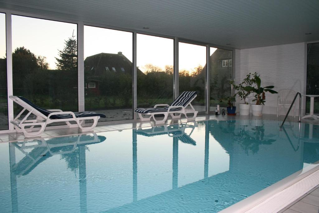 Ferienwohnungen Im Hotel Garni Zur Post Utersum Chambre photo